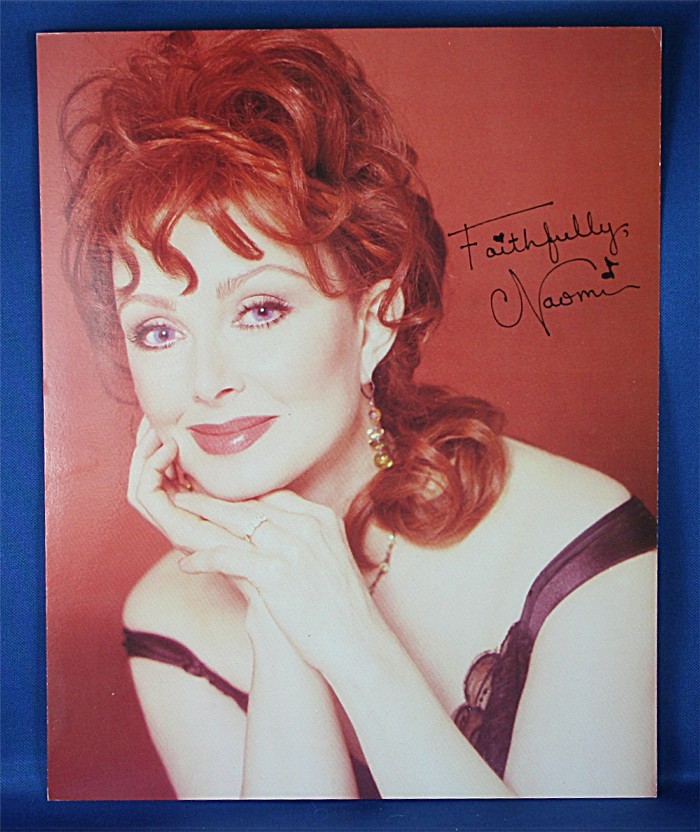 Naomi Judd - 8x10 color photograph red dress and backdrop
