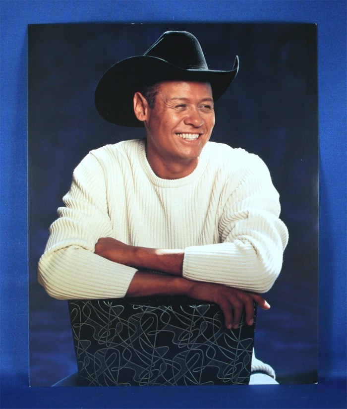 Neal McCoy - 8x10 color photograph sitting on black chair