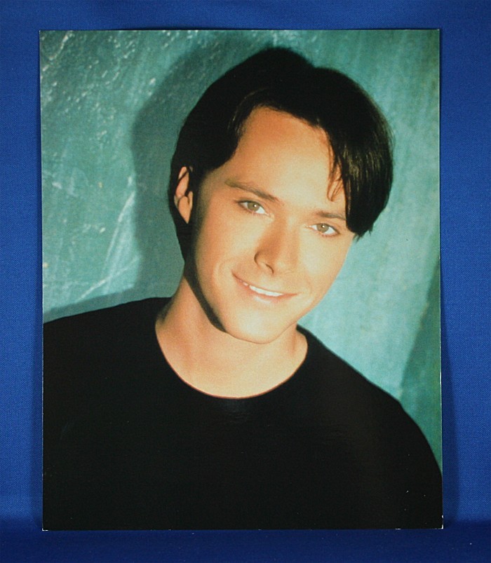 Bryan White - 8x10 color photograph on teal backdrop